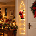 Escada luminosa com Papai Noel